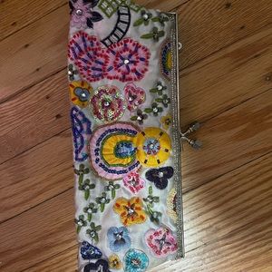 Floral sequin clutch bag